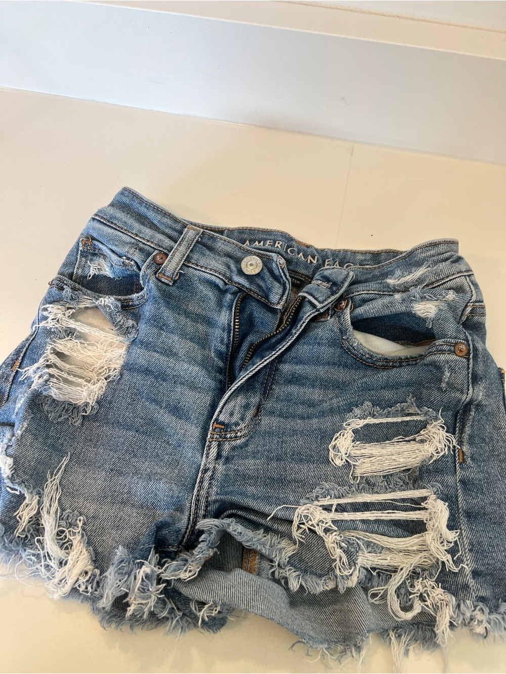 American Eagle Outfitters Ripped Light Blue Denim Cutoff Shorts